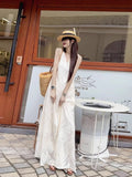 French Tea Winding V-Neck Sleeveless White Dress Women's Summer Loose And Thin Lazy Texture Long Holiday Dress