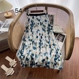 2025 New High-Rise Half-Dress Woman Tight Waist Ink Print Design Sense A-Character Skirt In The Long Folded Skirt