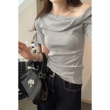2026 Early Spring Temperament Korean Hot Girls Twisting And Slanted Shoulders Short-Sleeved T-Shirt Women Commuting Summer Pure Desire