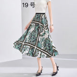 2025 New High-Rise Half-Dress Woman Tight Waist Ink Print Design Sense A-Character Skirt In The Long Folded Skirt