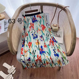 2025 New High-Rise Half-Dress Woman Tight Waist Ink Print Design Sense A-Character Skirt In The Long Folded Skirt