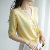 Short-Sleeved Ice Silk Knitted Women's 2026 Summer New Pearl Buckle Design Small Loose Thin Top