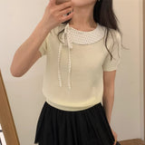 Korean Casual Fashion Doll-Necked Short-Sleeved T-Shirt Women 2026 Spring New Splicing Design Knitting Top