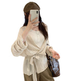 French Pure-Wisted Thin Hollow Long-Sleeved Knitted Cardigan Women 2025 Autumn New Small Mature Temperament Small Top