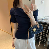 2026 Early Spring Temperament Korean Hot Girls Twisting And Slanted Shoulders Short-Sleeved T-Shirt Women Commuting Summer Pure Desire