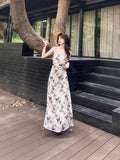 Clear Cold Water Ink Butterfly Sling Dress Women 2026 Summer New French Chic Body-Repair Temperament Long Dress